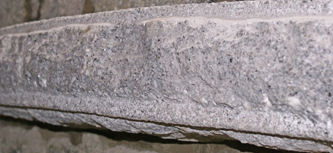 carved granite mantelpiece